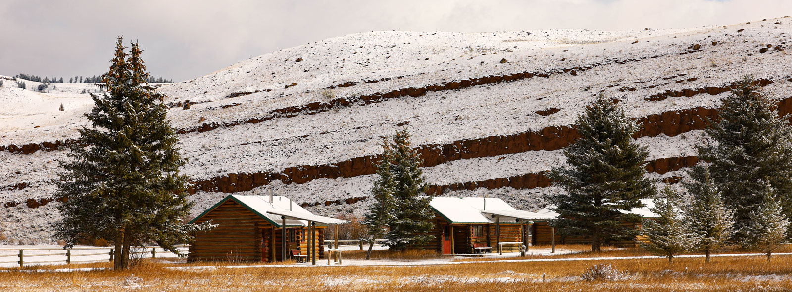 Snow on the cabins on the Red Rock Ranch